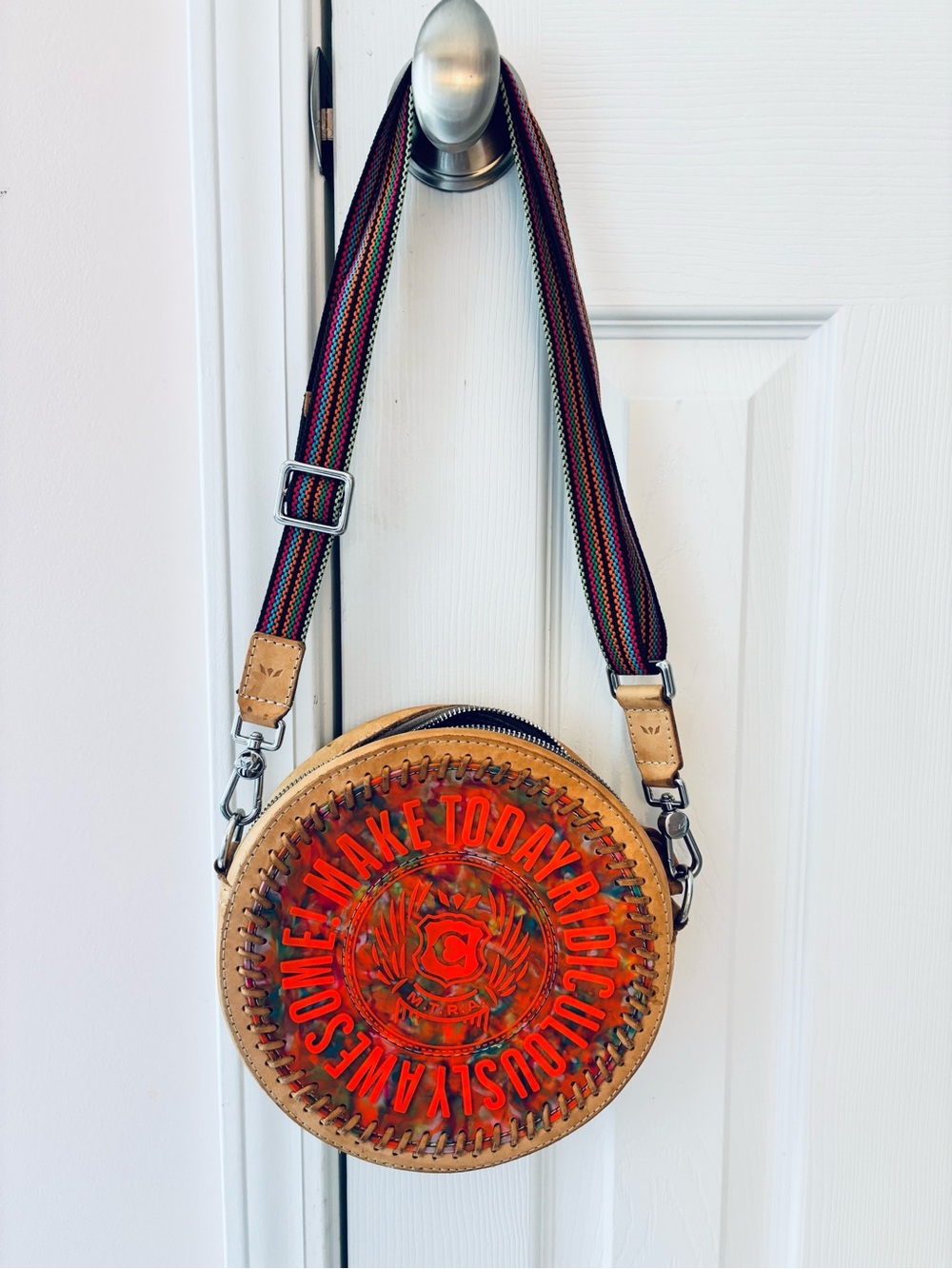 Consuela Round Leather Crossbody in Tan with Red-Orange Graphic